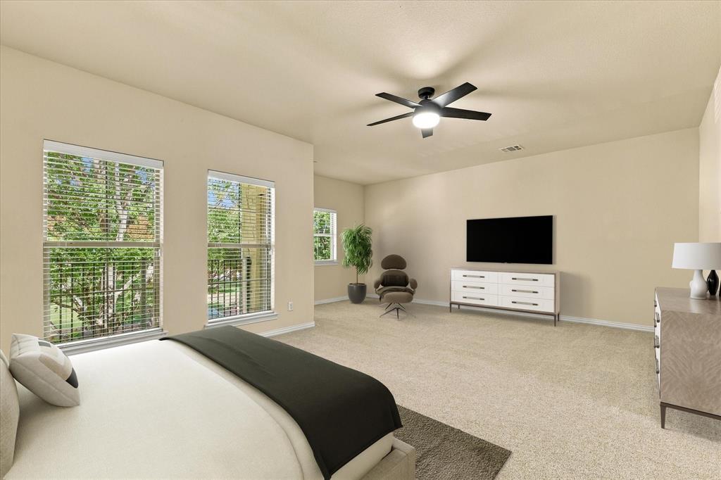 Wake up to beautiful treetop views in your oversized primary suite with plenty of room for additional seating and direct access to your covered balcony. Virtual Staging.