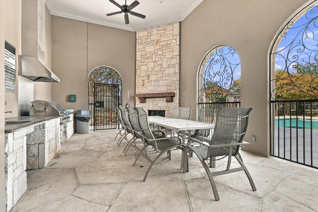 The clubhouse cabana offers grilling space, comfortable seating, and a cozy fireplace, all right next to the pool and across the street from your front door.