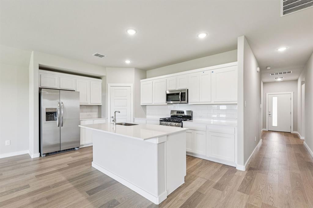 Kitchen in the Harper home plan – REPRESENTATIVE PHOTO Kitchen in the Harper home plan – REPRESENTATIVE PHOTO