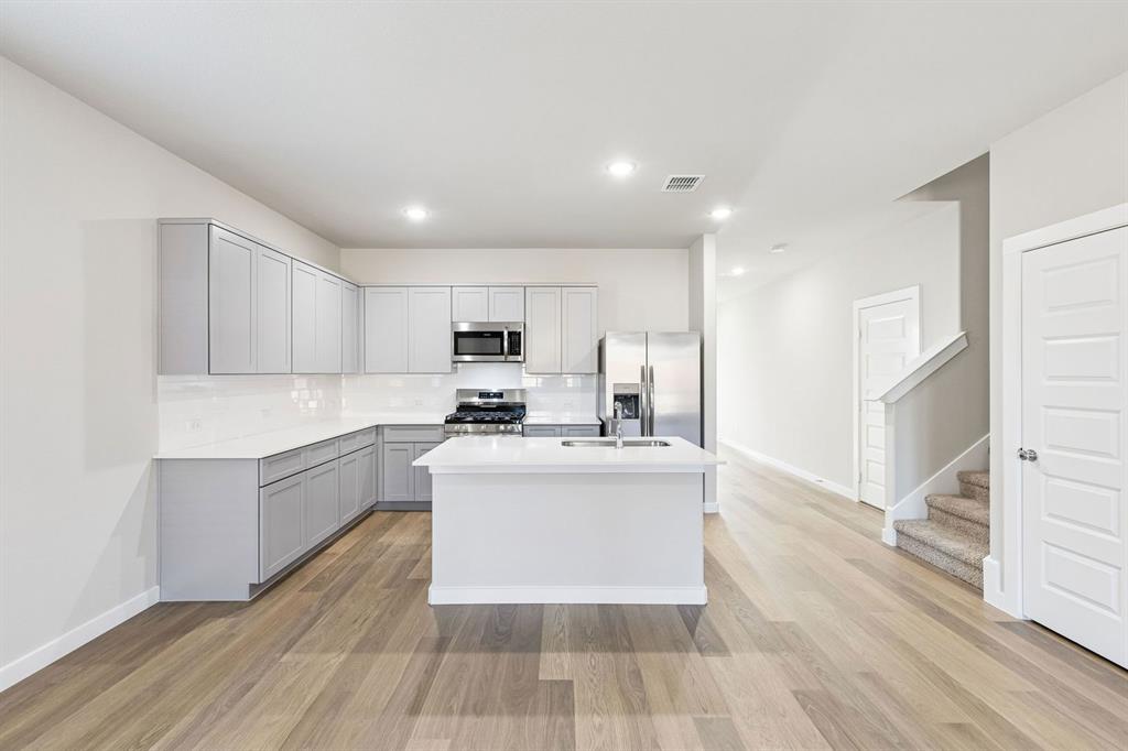 Kitchen in the Haylee home plan - REPRESENTATIVE PHOTO