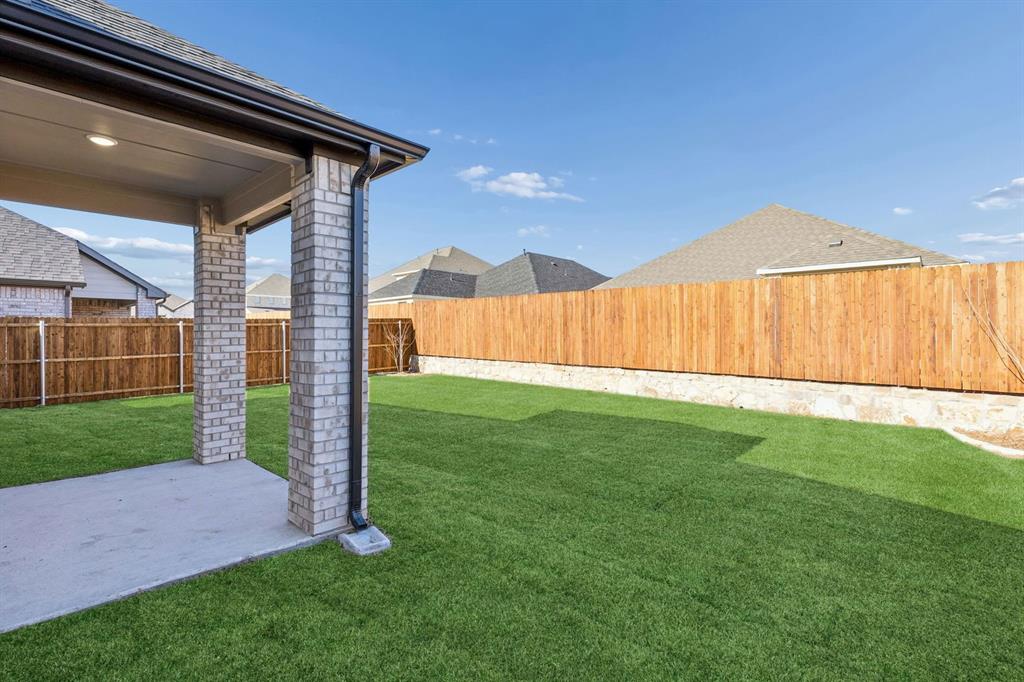 Covered Patio in the Haylee home plan - REPRESENTATIVE PHOTO