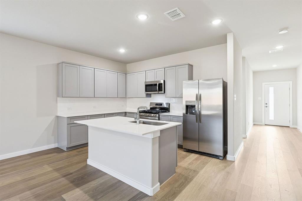 Kitchen in the Haylee home plan - REPRESENTATIVE PHOTO Kitchen in the Haylee home plan - REPRESENTATIVE PHOTO