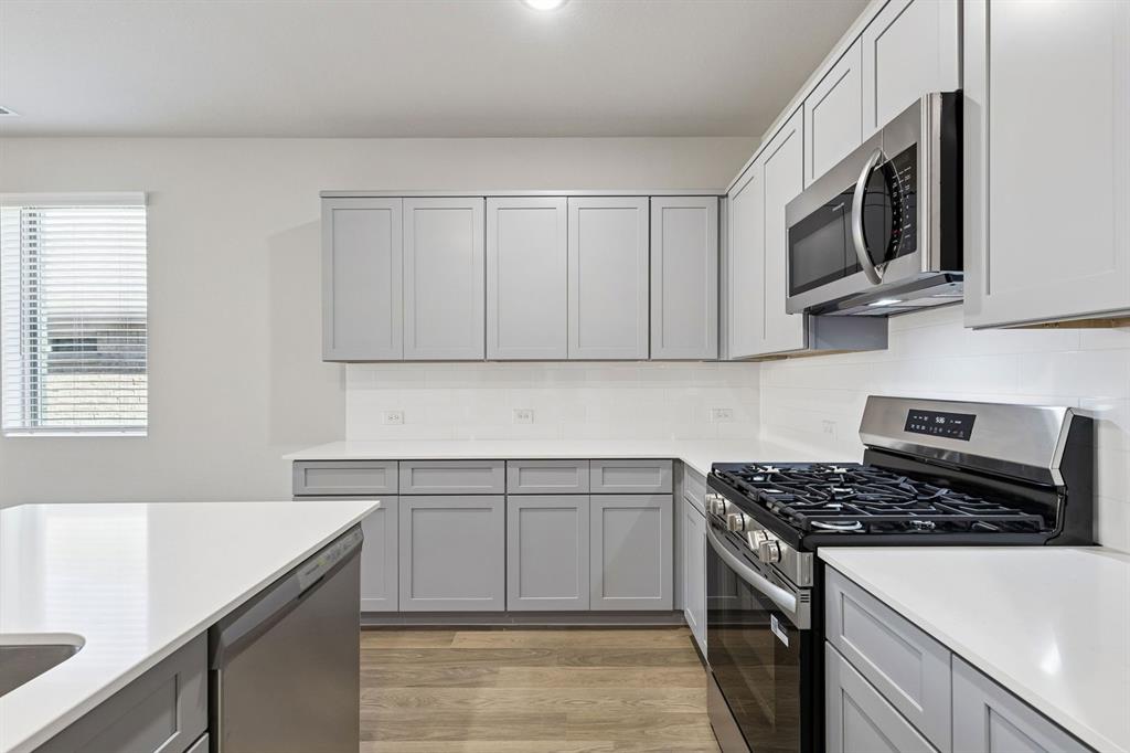 Kitchen in the Haylee home plan - REPRESENTATIVE PHOTO Kitchen in the Haylee home plan - REPRESENTATIVE PHOTO