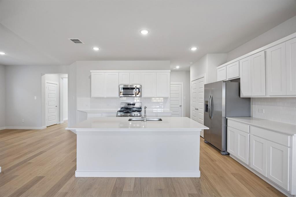 Kitchen in the Oak II home plan – REPRESENTATIVE PHOTO
