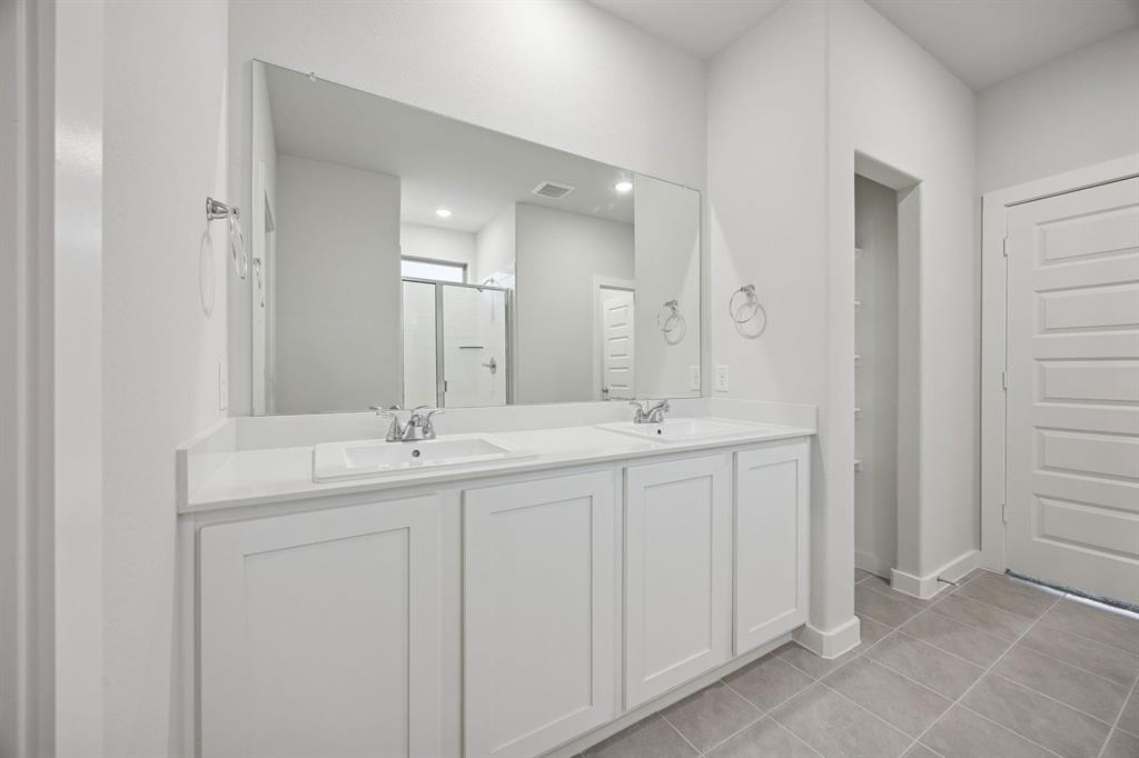 Primary Bathroom in the Oak II home plan – REPRESENTATIVE PHOTO