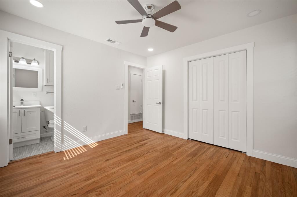 Wood-finish flooring, recessed lighting, ceiling fan, bi-fold closet doors, and solid-core interior doors