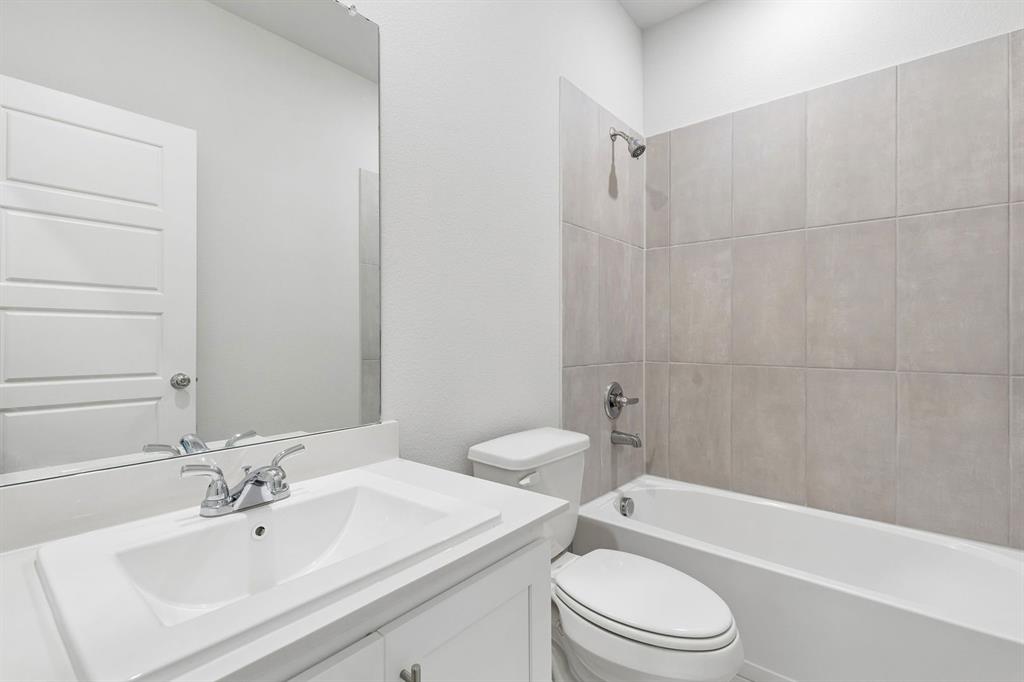 Bathroom in the Cypress home plan - REPRESENTATIVE PHOTO
