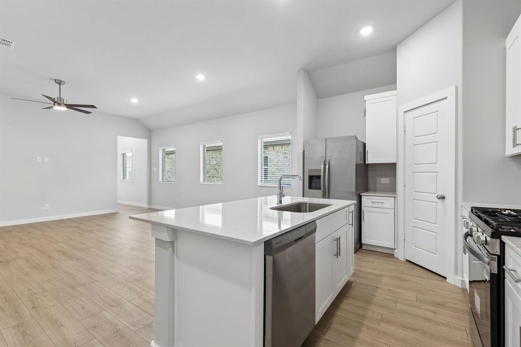 Kitchen in the Cypress home plan - REPRESENTATIVE PHOTO
