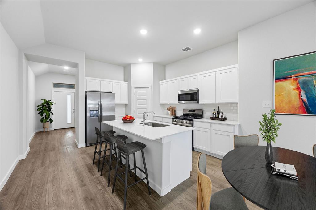 Kitchen in the Cedar home plan – REPRESENTATIVE PHOTO