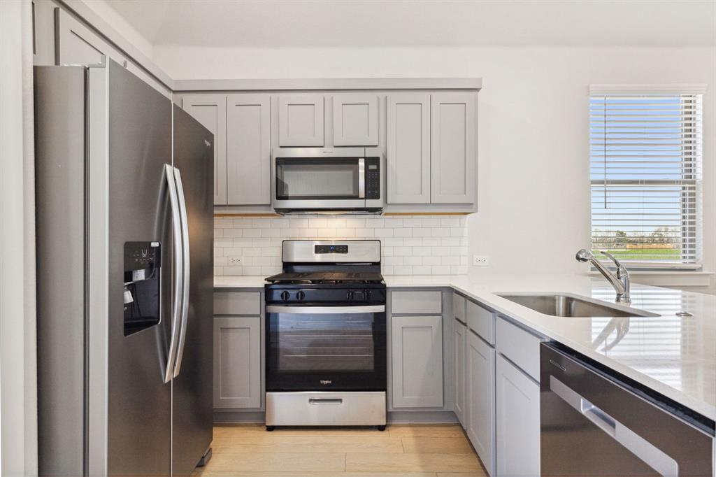 Kitchen in the Ash home plan – REPRESENTATIVE PHOTO