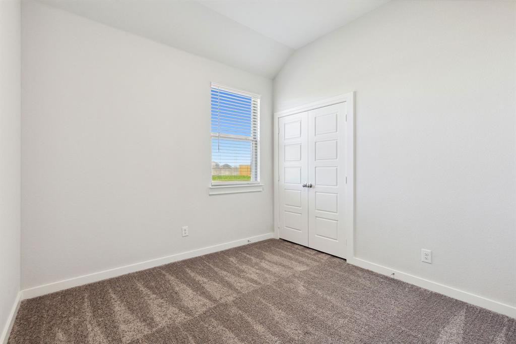 Bedroom in the Ash home plan – REPRESENTATIVE PHOTO