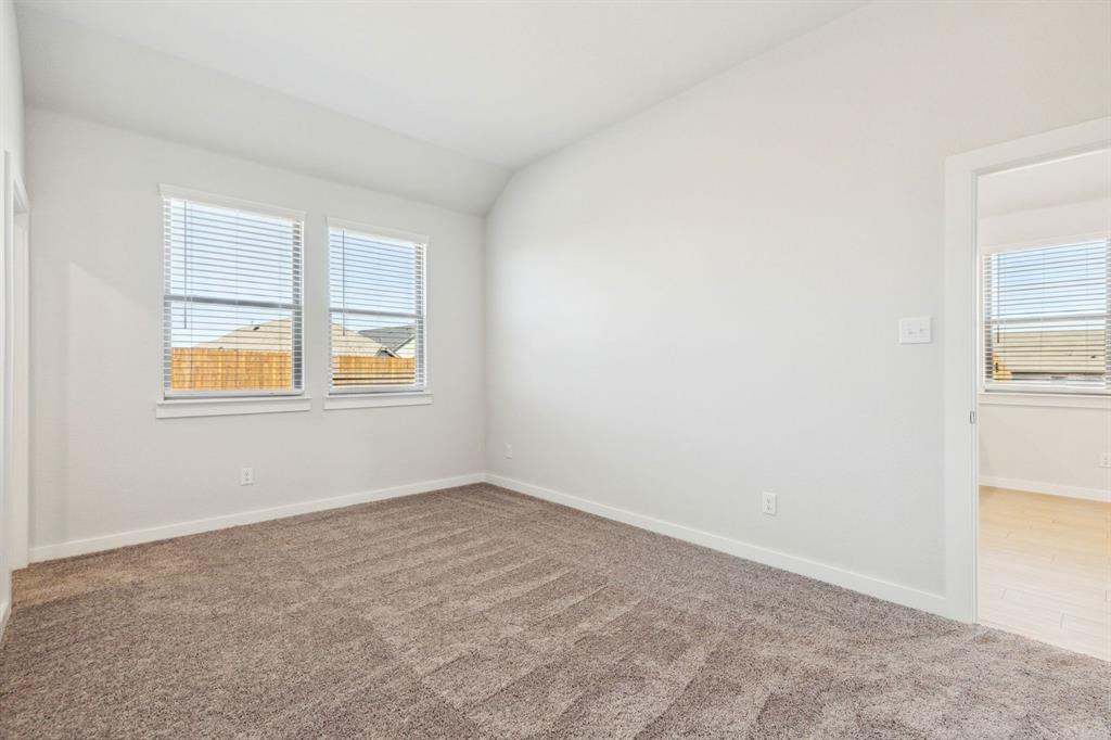 Bedroom in the Ash home plan – REPRESENTATIVE PHOTO