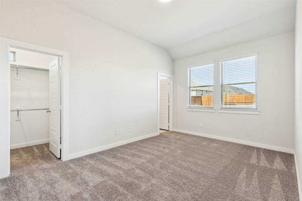 Bedroom in the Ash home plan – REPRESENTATIVE PHOTO