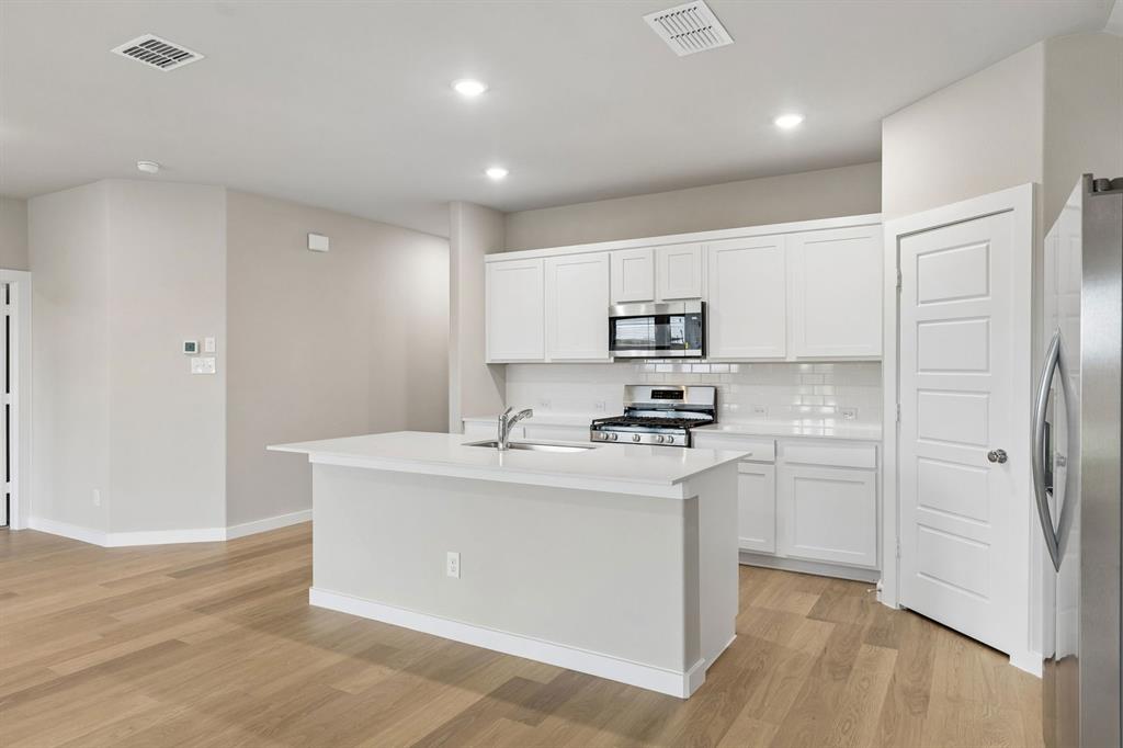 Kitchen in the Emmy II home plan - REPRESENTATIVE PHOTO
