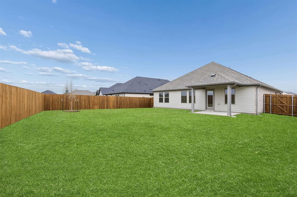 Covered Patio in the Emmy II home plan - REPRESENTATIVE PHOTO