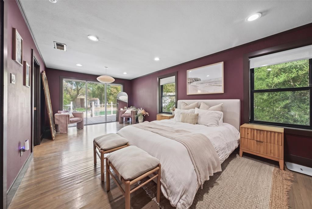 Wood-finish flooring, recessed lighting, sliding glass door, and multi-pane windows