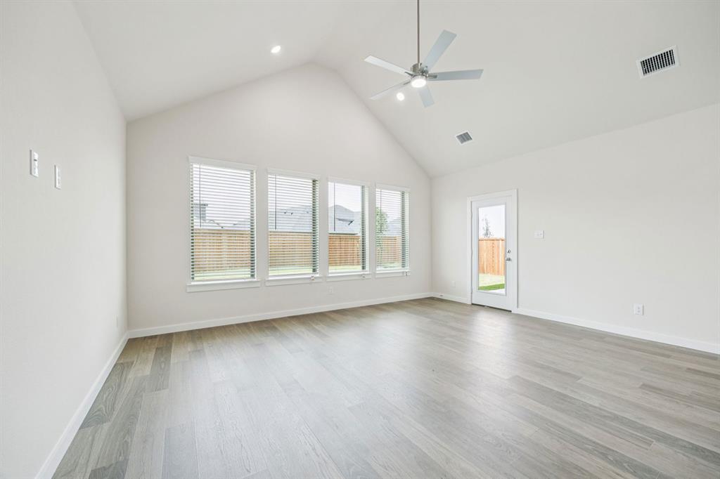 Living Room in the Claret home plan – REPRESENTATIVE PHOTO