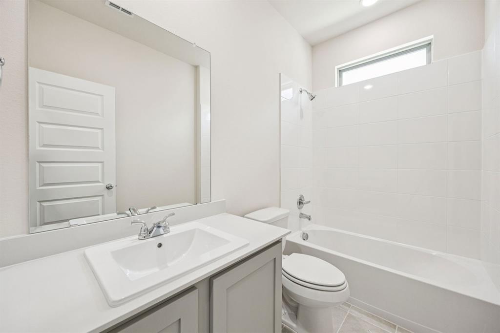 Bathroom in the Claret home plan – REPRESENTATIVE PHOTO