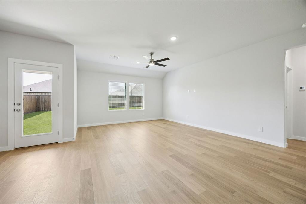 Living Room in the Heisman home plan – REPRESENTATIVE PHOTO