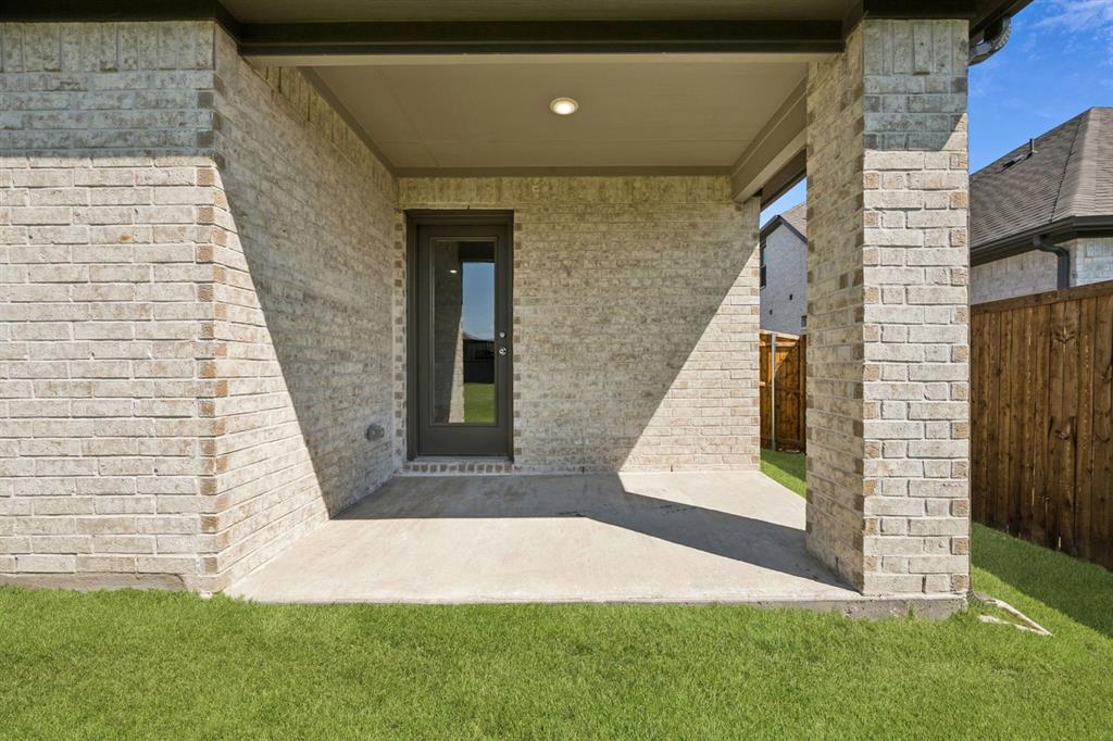 Covered Patio in the Heisman home plan – REPRESENTATIVE PHOTO
