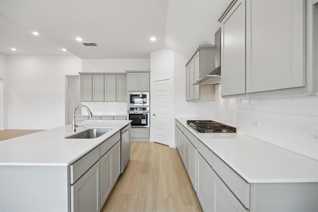 Kitchen in the Gilmour II home plan – REPRESENTATIVE PHOTO