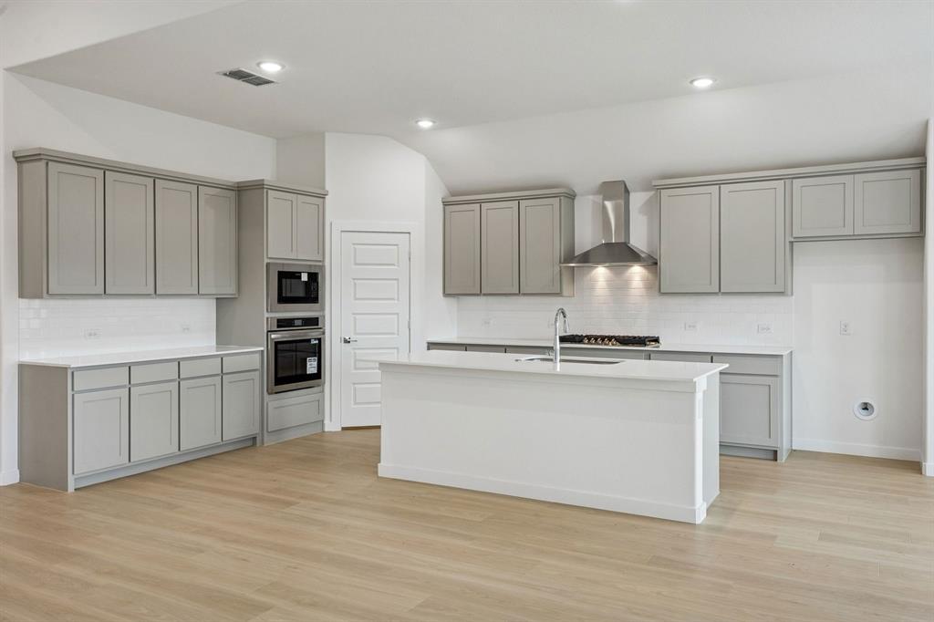 Kitchen in the Gilmour II home plan – REPRESENTATIVE PHOTO