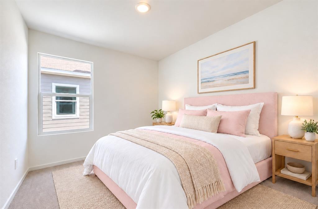 Neutral-toned carpeted flooring, white walls, and a single-hung window featuring white trim