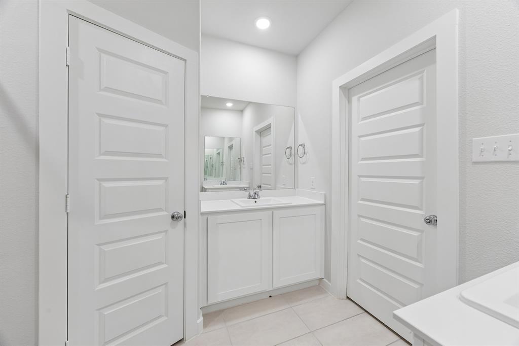 Primary Bathroom in the Cedar home plan – REPRESENTATIVE PHOTO