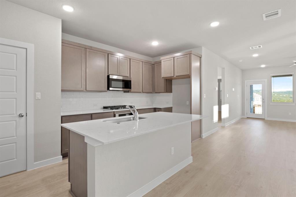 Kitchen in the Willow home plan – REPRESENTATIVE PHOTO Kitchen in the Willow home plan – REPRESENTATIVE PHOTO