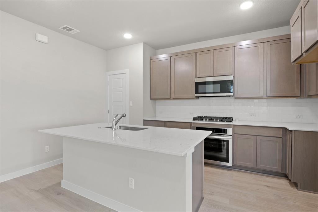 Kitchen in the Willow home plan – REPRESENTATIVE PHOTO