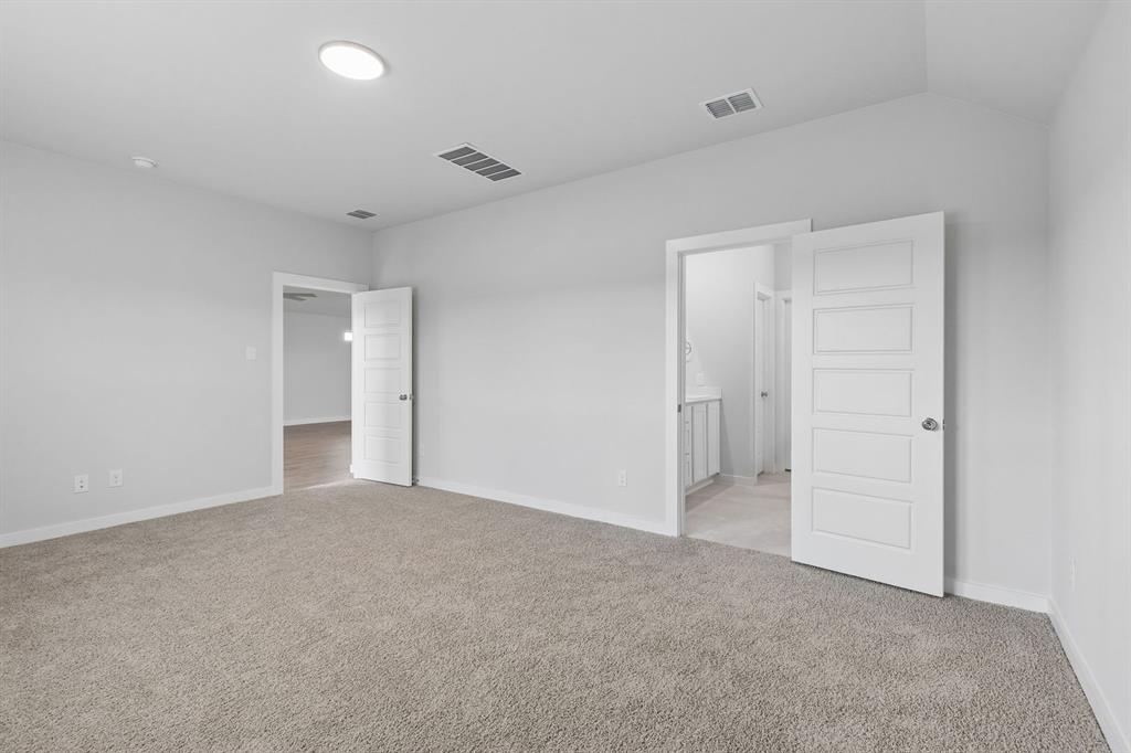 Primary Suite in the Oscar home plan – REPRESENTATIVE PHOTO