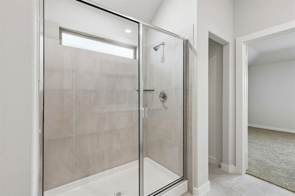 Primary Bathroom in the Oscar home plan – REPRESENTATIVE PHOTO