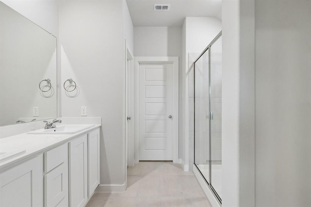 Primary Bathroom in the Oscar home plan – REPRESENTATIVE PHOTO