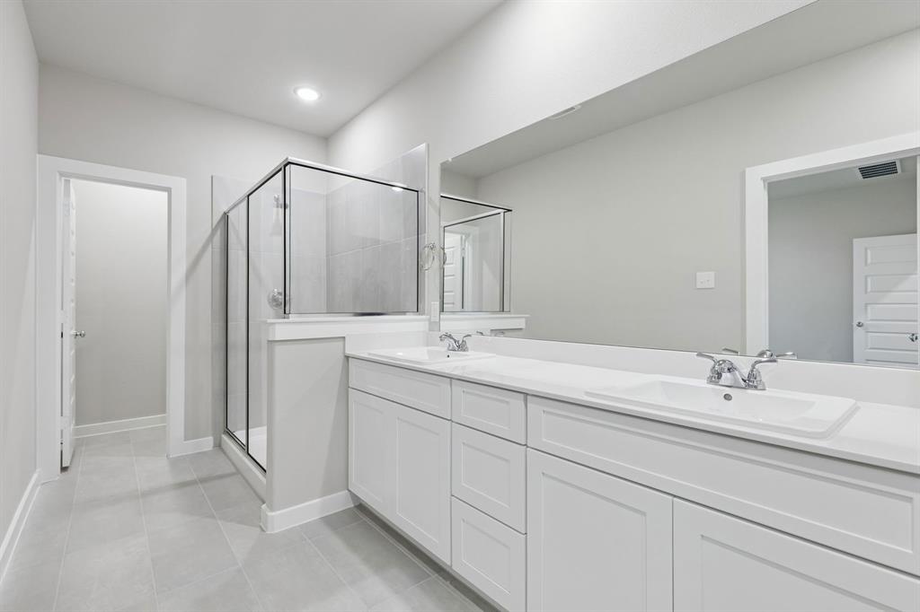 Primary Bathroom in the Holden home plan – REPRESENTATIVE PHOTO