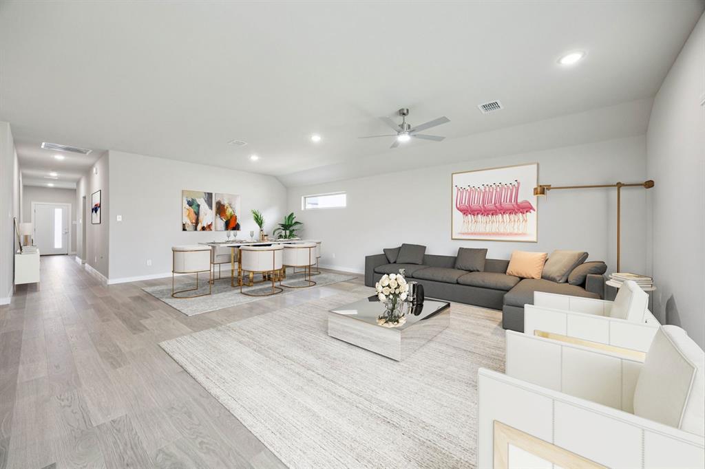 Dining and Living Room in the Hayden home plan – REPRESENTATIVE PHOTO