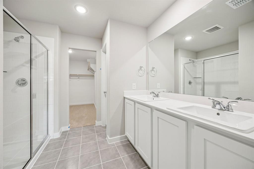 Primary Bathroom in the Hayden home plan – REPRESENTATIVE PHOTO