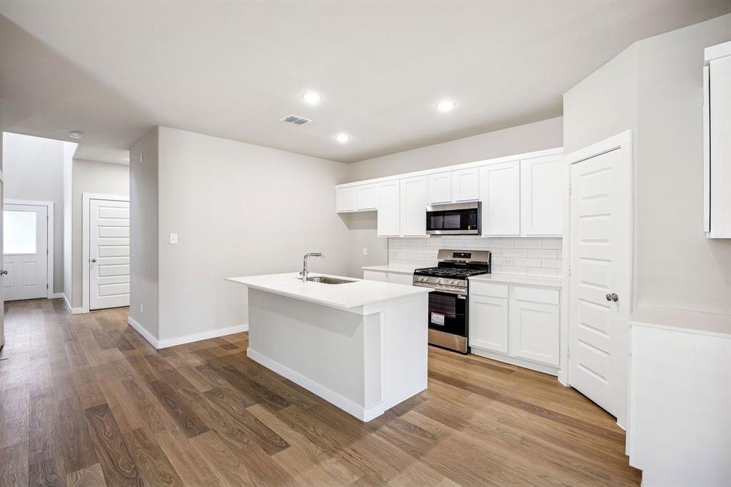 Kitchen in the Willow home plan – REPRESENTATIVE PHOTO
