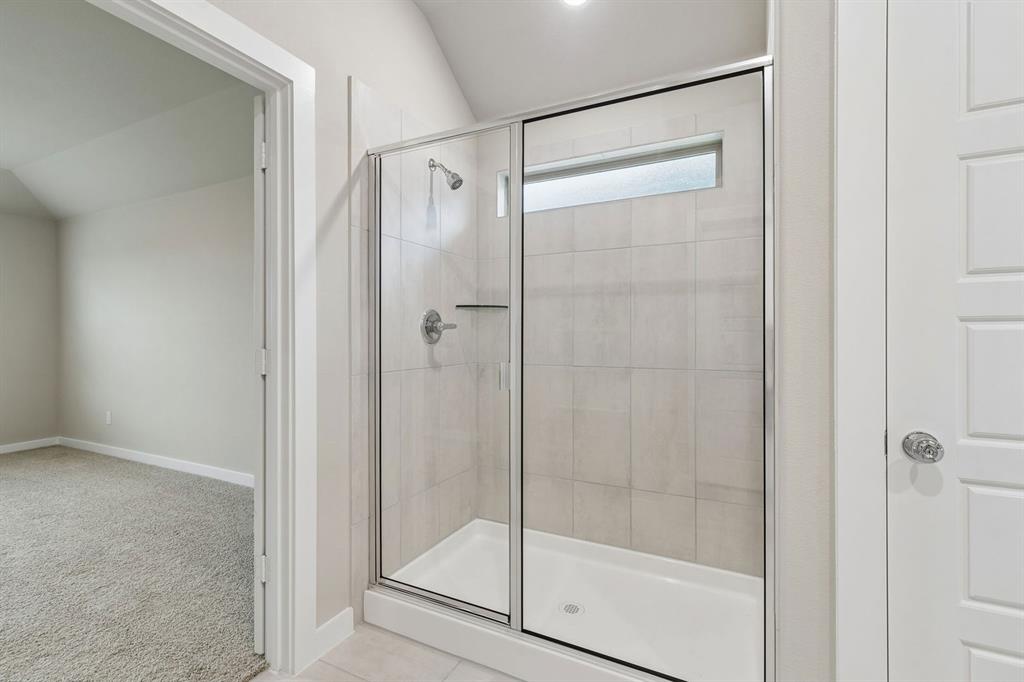 Primary Bathroom in the Emmy II home plan - REPRESENTATIVE PHOTO