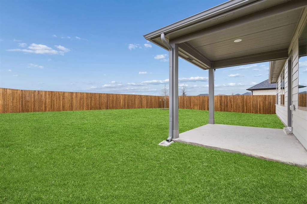 Covered Patio in the Emmy II home plan - REPRESENTATIVE PHOTO