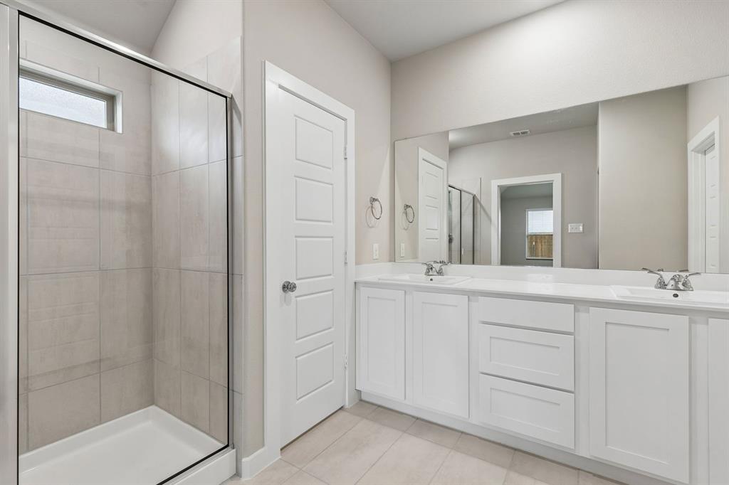 Primary Bathroom in the Emmy II home plan - REPRESENTATIVE PHOTO