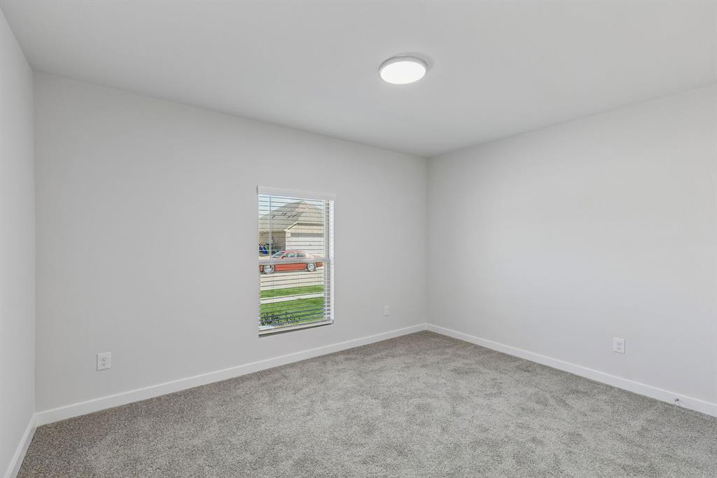 Bedroom in the Harrison home plan – REPRESENTATIVE PHOTO