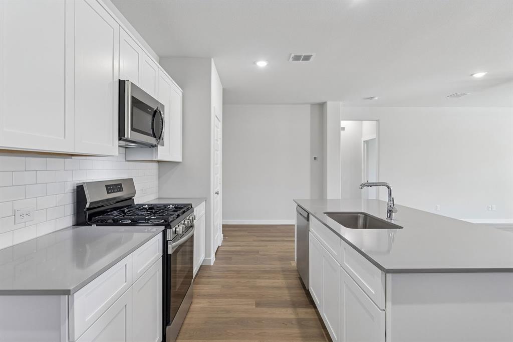 Kitchen in the Harrison home plan – REPRESENTATIVE PHOTO