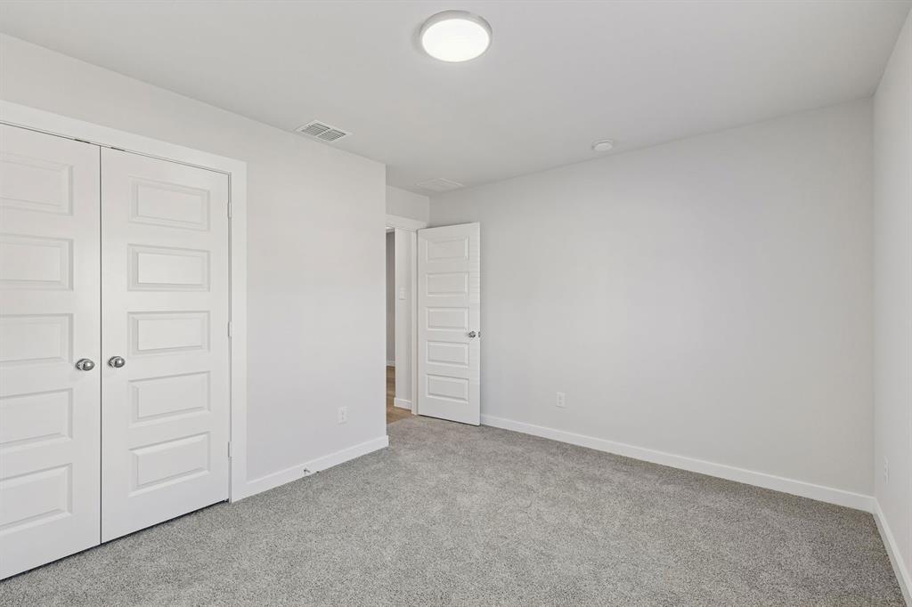 Bedroom in the Harrison home plan – REPRESENTATIVE PHOTO