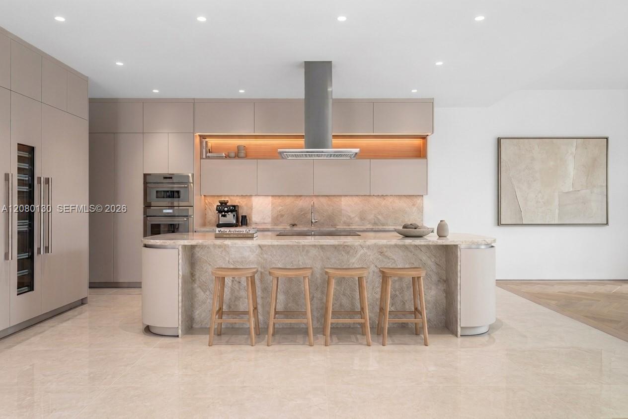 Kitchen. Disclaimer: Several photographs presented in this listing contain digitally added furniture, artwork, and decor. These virtually staged images are intended solely for illustrative purposes.