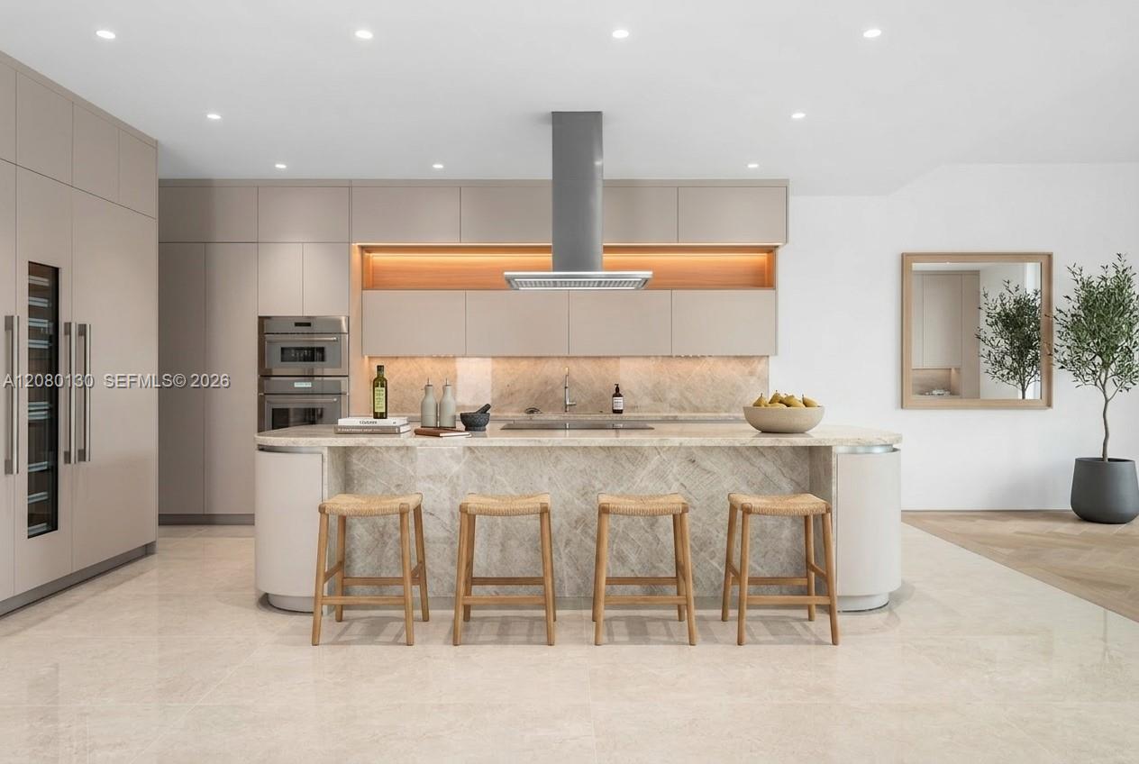 Kitchen. Disclaimer: Several photographs presented in this listing contain digitally added furniture, artwork, and decor. These virtually staged images are intended solely for illustrative purposes.