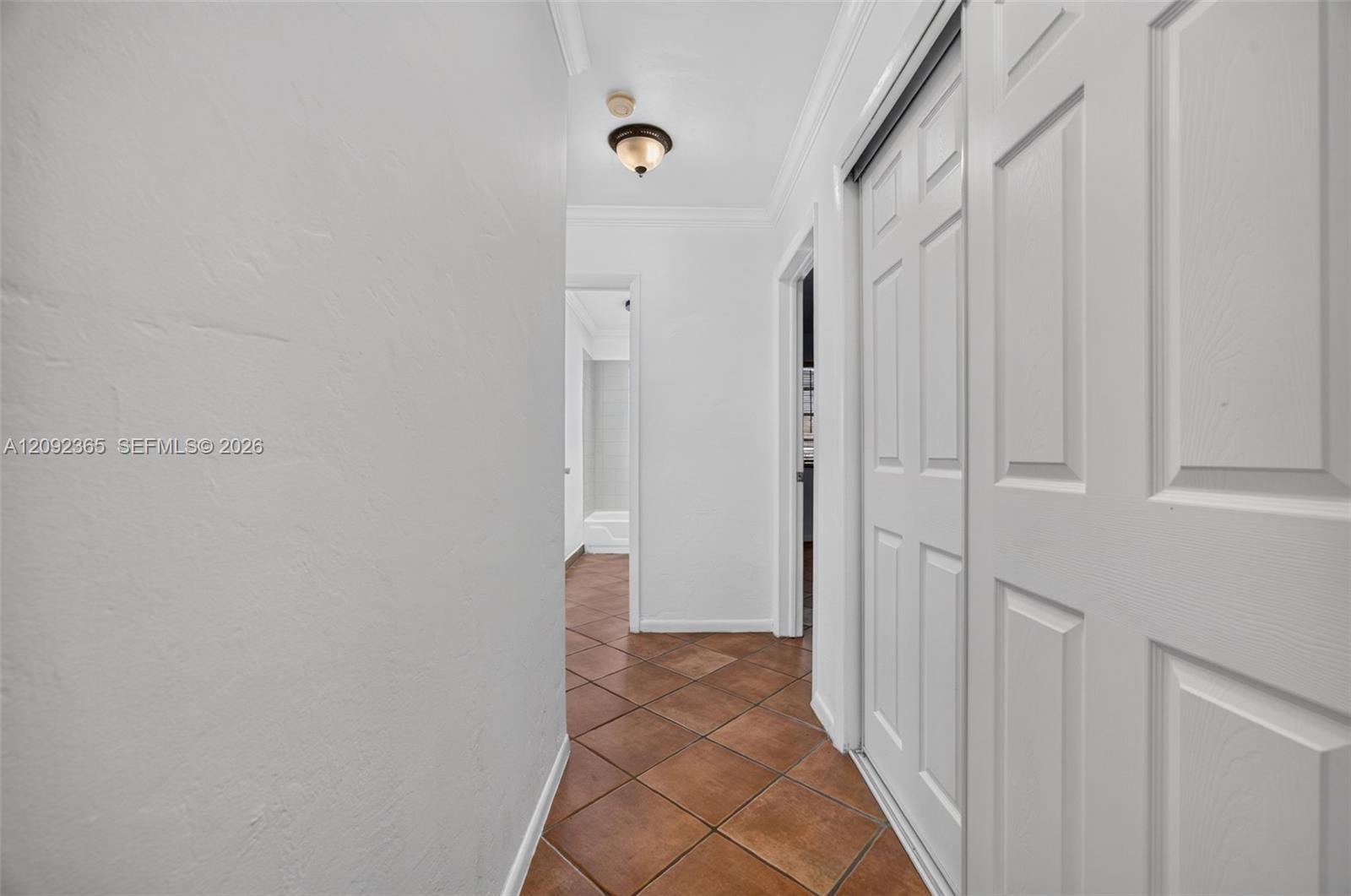 Hallway with closets.