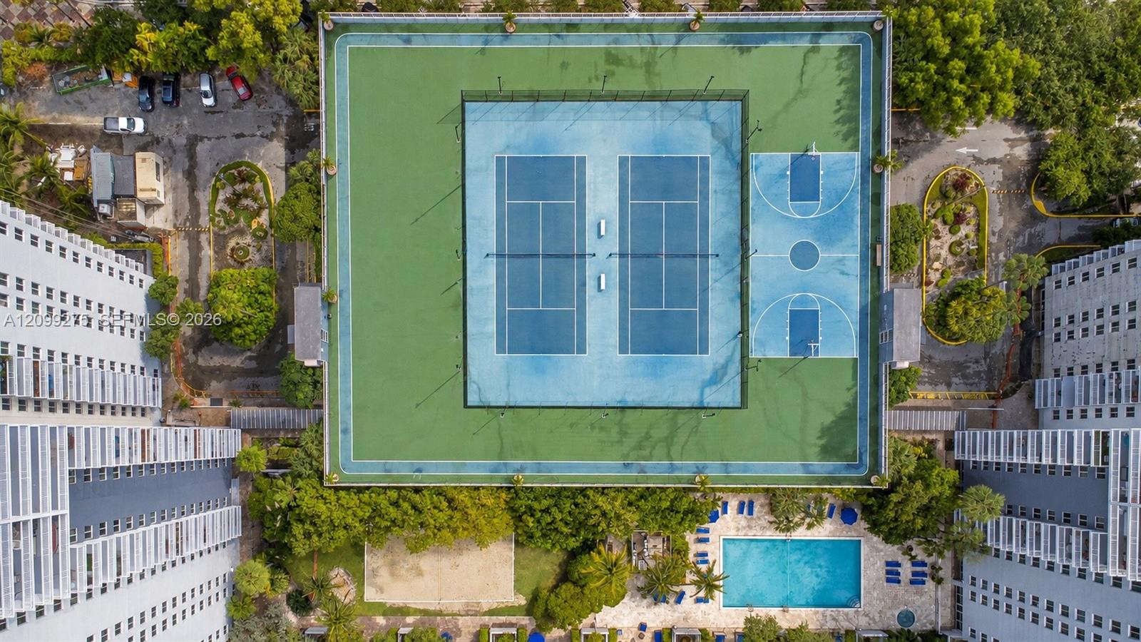 Resort-style amenities featuring tennis courts, a basketball court, a swimming pool, and beautifully landscaped grounds for recreation and relaxation.