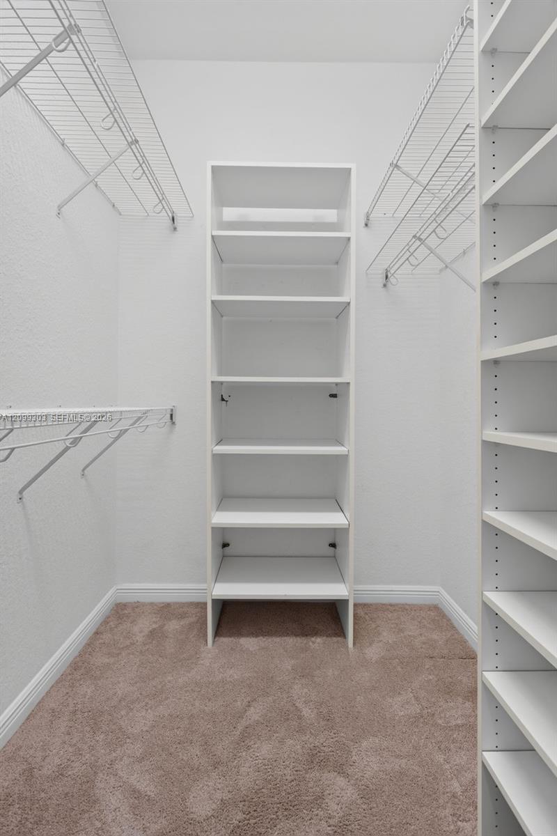 Primary Bedroom Walk in Closet