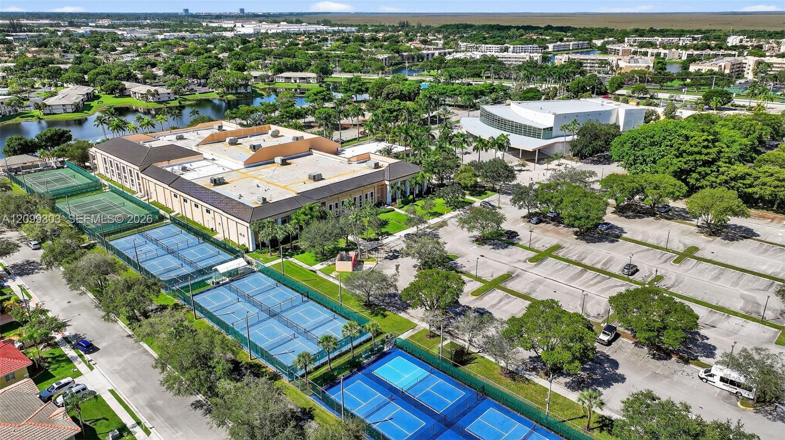 Kings Point Clubhouse, The Palace Theater, Tennis/Pickle Ball Courts, and Pool Area