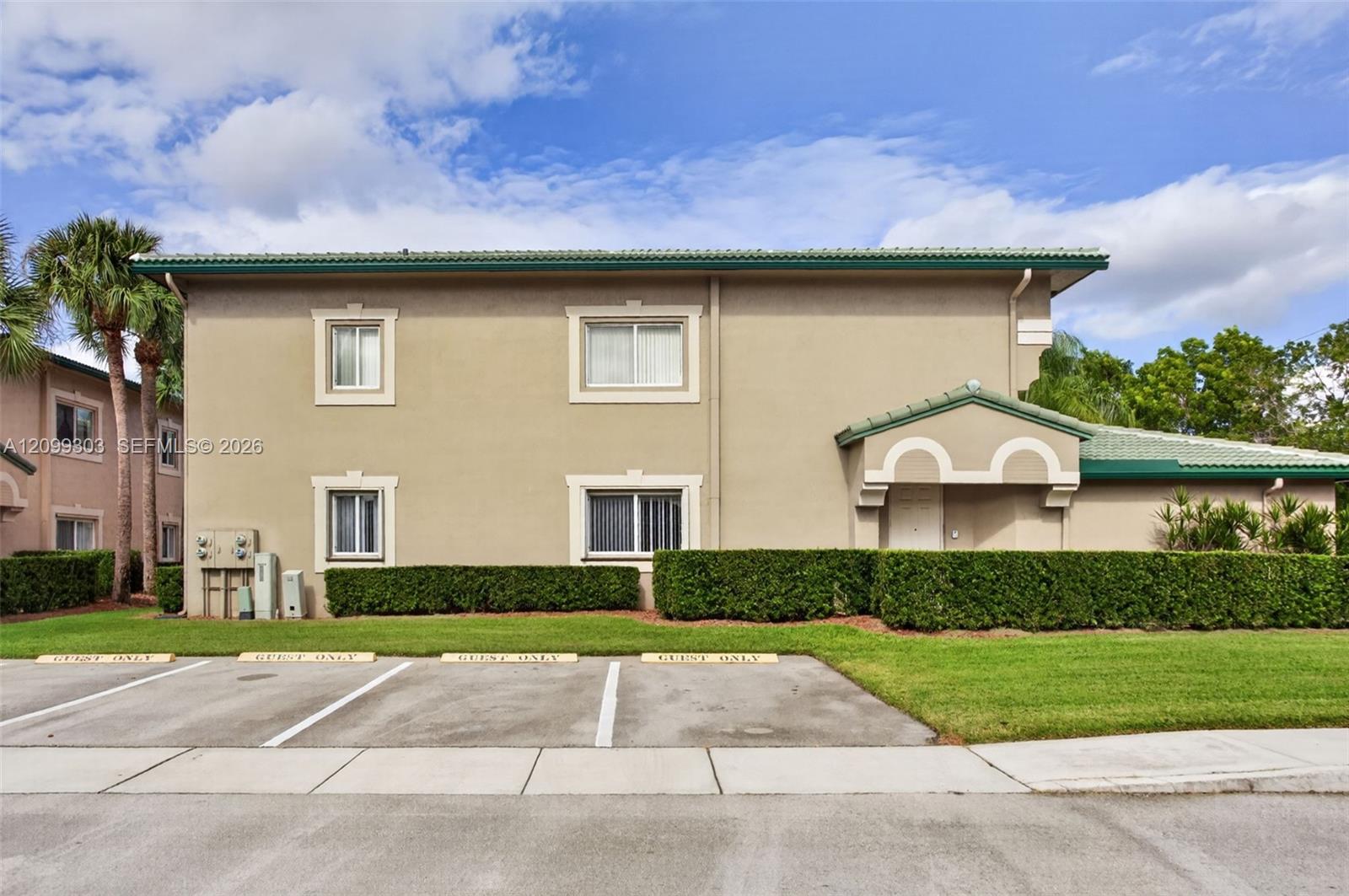 Additional guest parking adjacent to Unit.